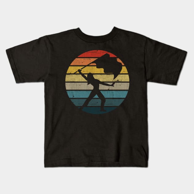 Colour Guard Silhouette On A Distressed Retro Sunset design Kids T-Shirt by theodoros20